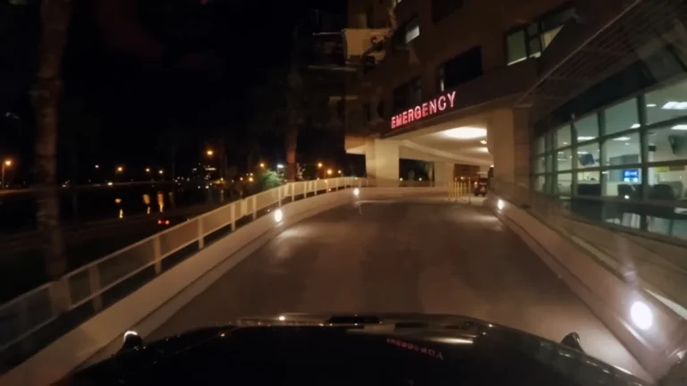 Emergency Entrance of A Hospital at Night, Illustrating the Critical Role of Paramedic Response Time in Saving Lives